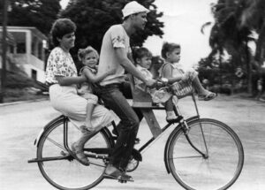 Family riding a bike in Cuba